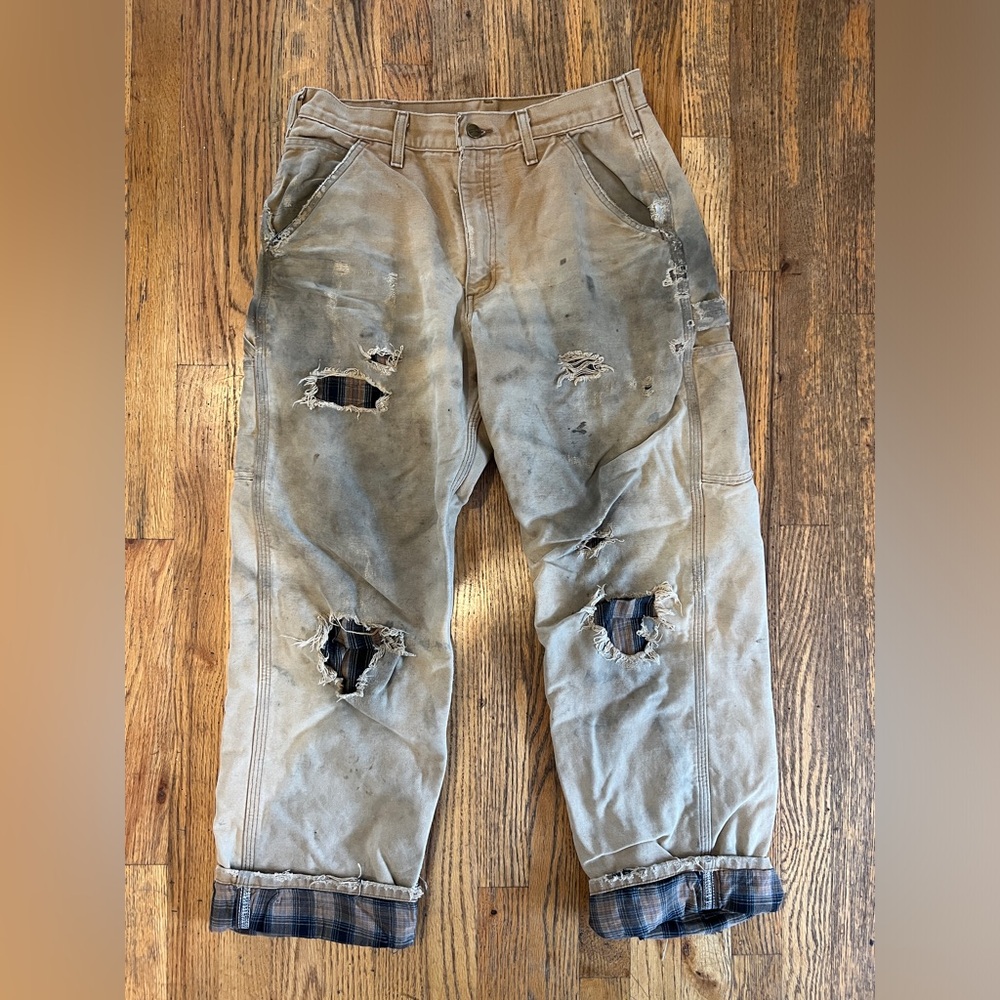 Vintage naturally worn and faded Carhartt pants